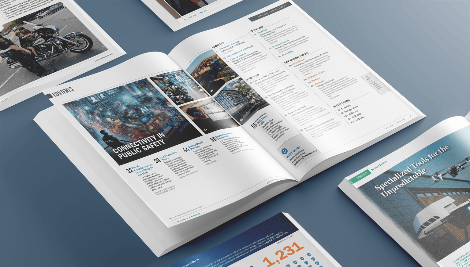 An overhead view of several open issues of Police Chief magazine displayed on a blue surface. The central spread shows the table of contents for the April 2025 issue, featuring sections on leadership, technology, field operations, and public safety. Prominent images highlight articles such as 'Connectivity in Public Safety,' 'Police Fleet Products,' and 'Embedding Tech in Policing.' Nearby pages display additional articles, including one titled “Specialized Tools for the Unpredictable,' featuring a drone image.