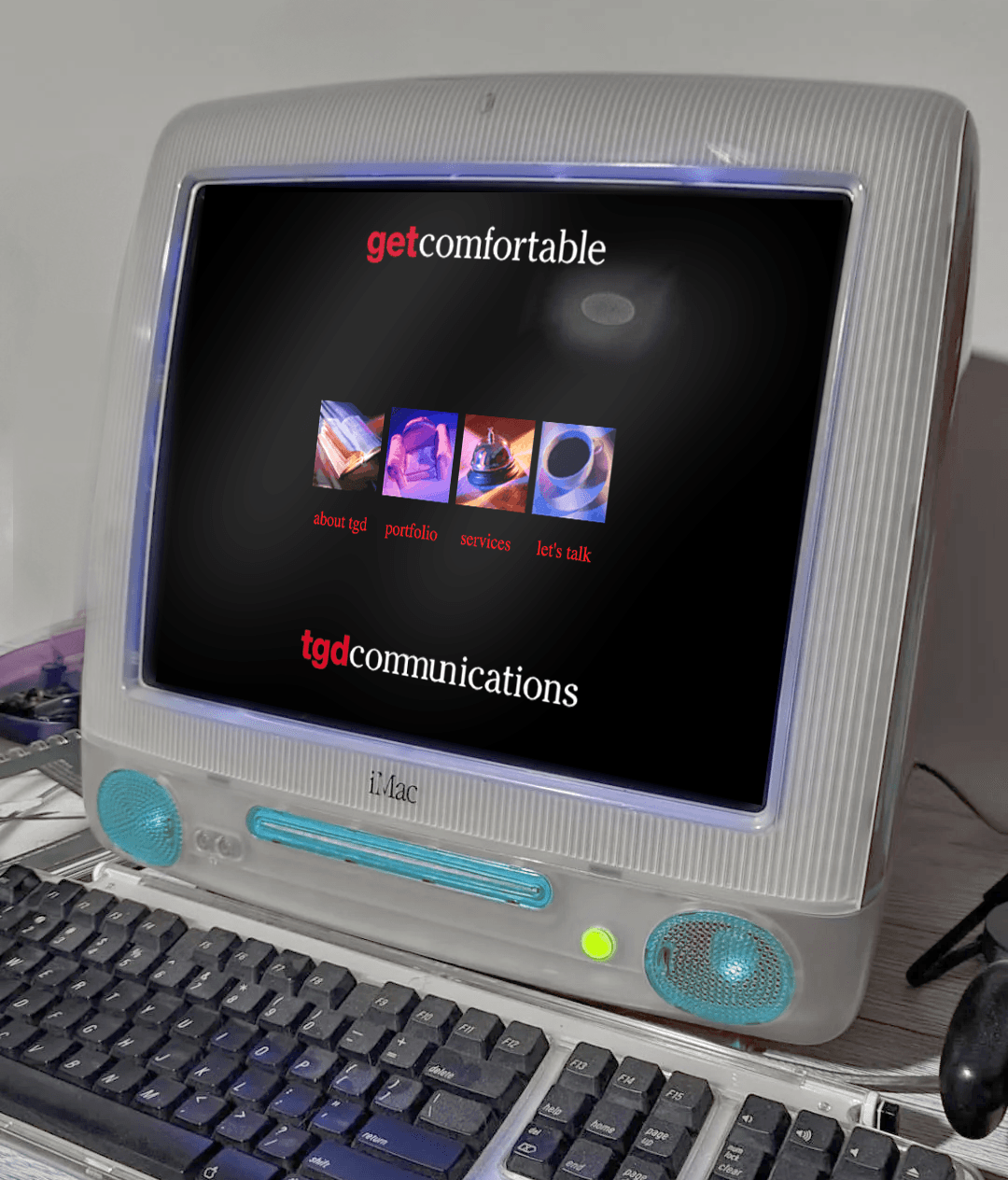 Picture of 2 women talking at a table in front of a sign reading "Welcome to the Opinion Donor Lounge"